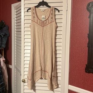 NWT woman’s cream colored dress